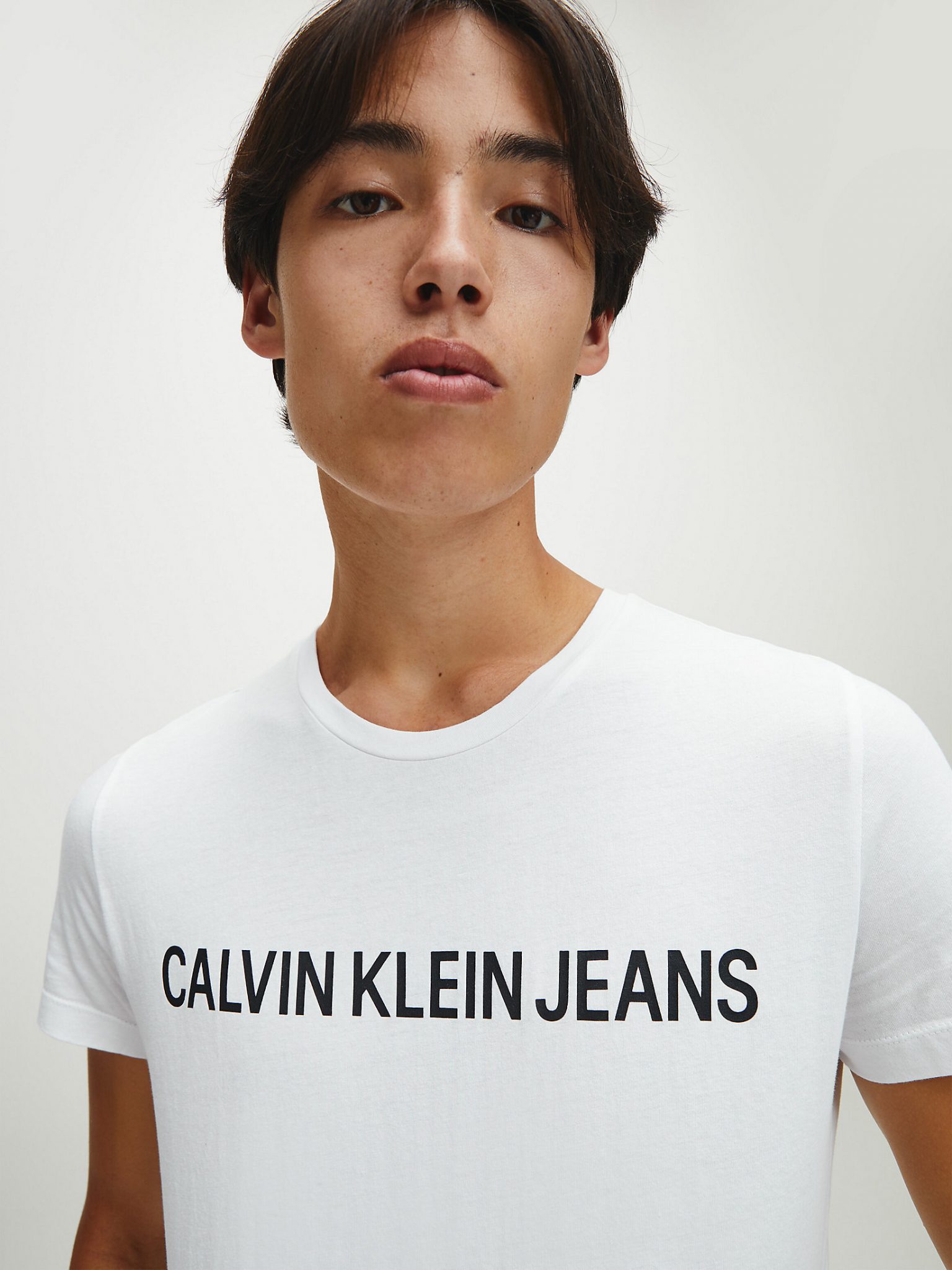 Buy Calvin Klein Scandinavian Institutional Fashion logo Store White T-shirt - Bright