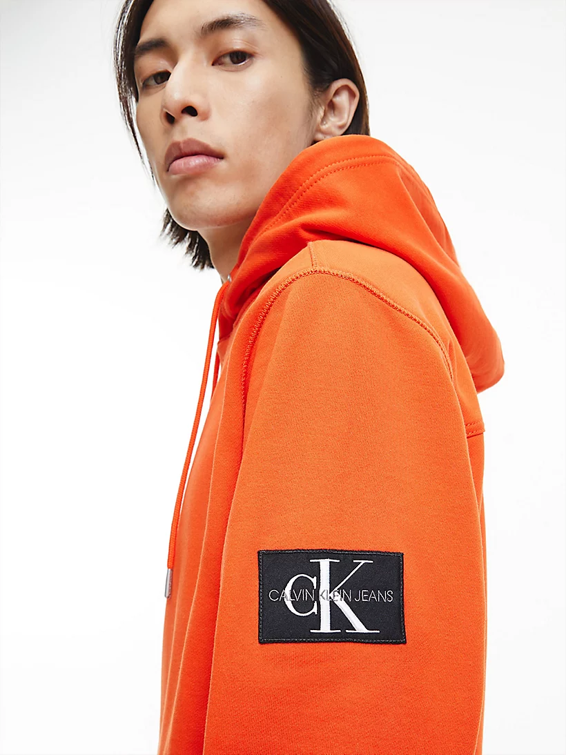 Buy Calvin Klein Orange - Scandinavian Hoodie Sleeve Store Monologo Badge Fashion Coral