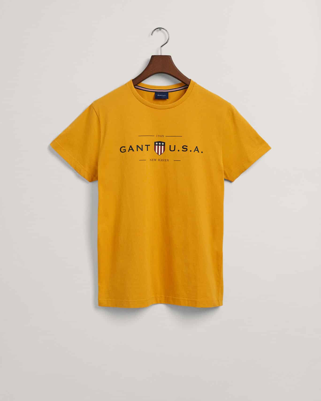 Buy Gant Banner Shield - Ivy Scandinavian Store Fashion Gold T-shirt