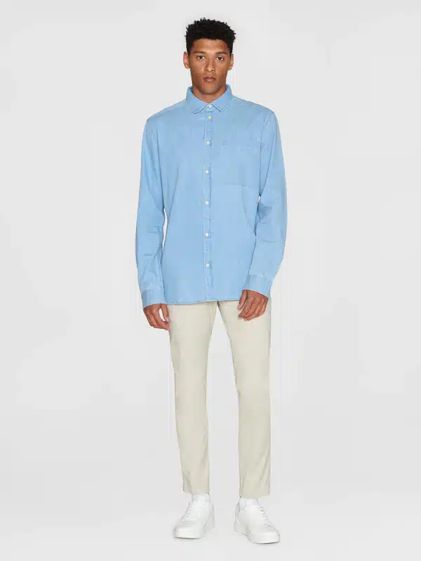 Men's bleached light wash denim shirt worn with mid-blue denim jeans | Mens  outfits, Blue denim shirt, Denim shirt outfit